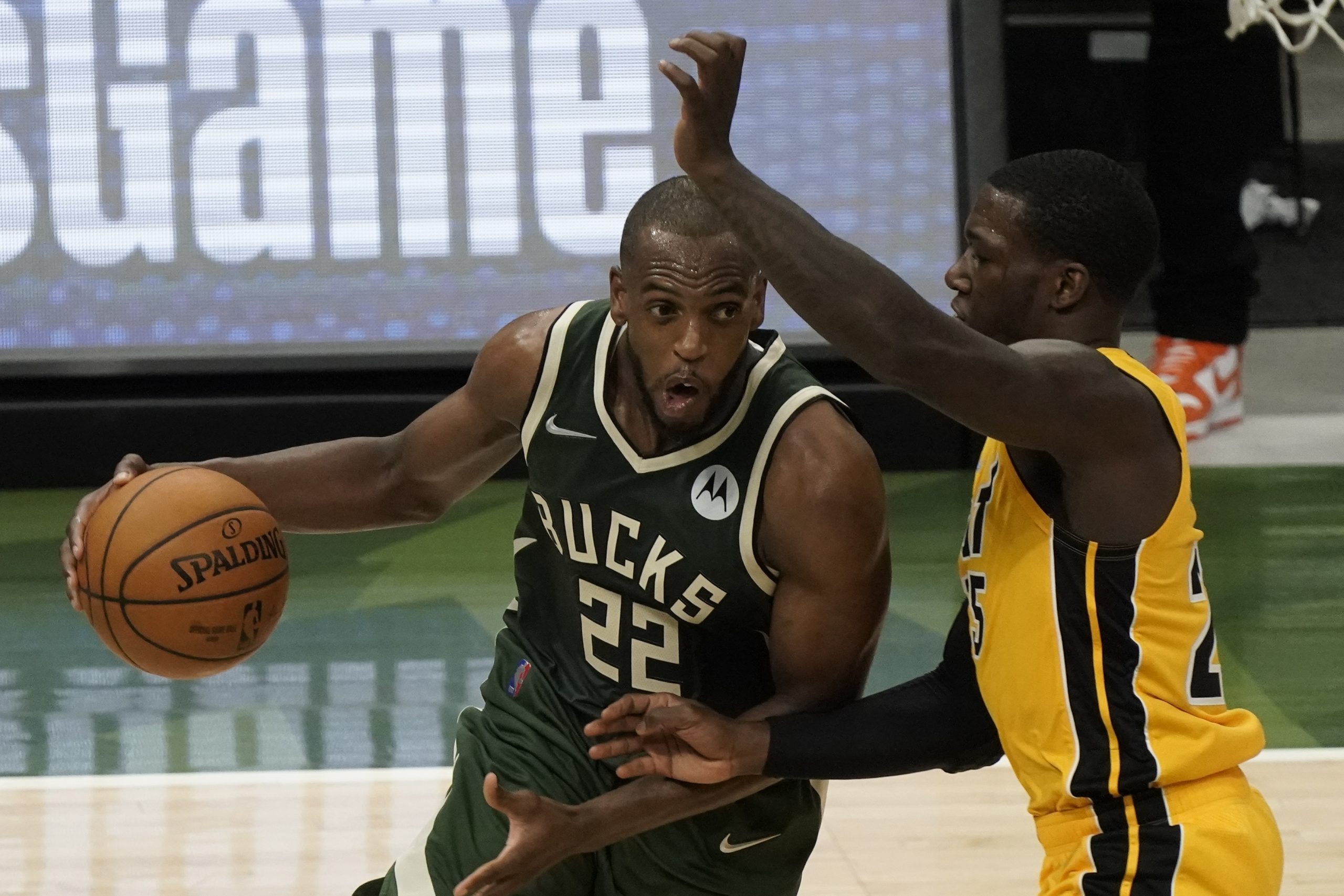 Khris Middleton snatches late win for Milwaukee Bucks in play-off opener
