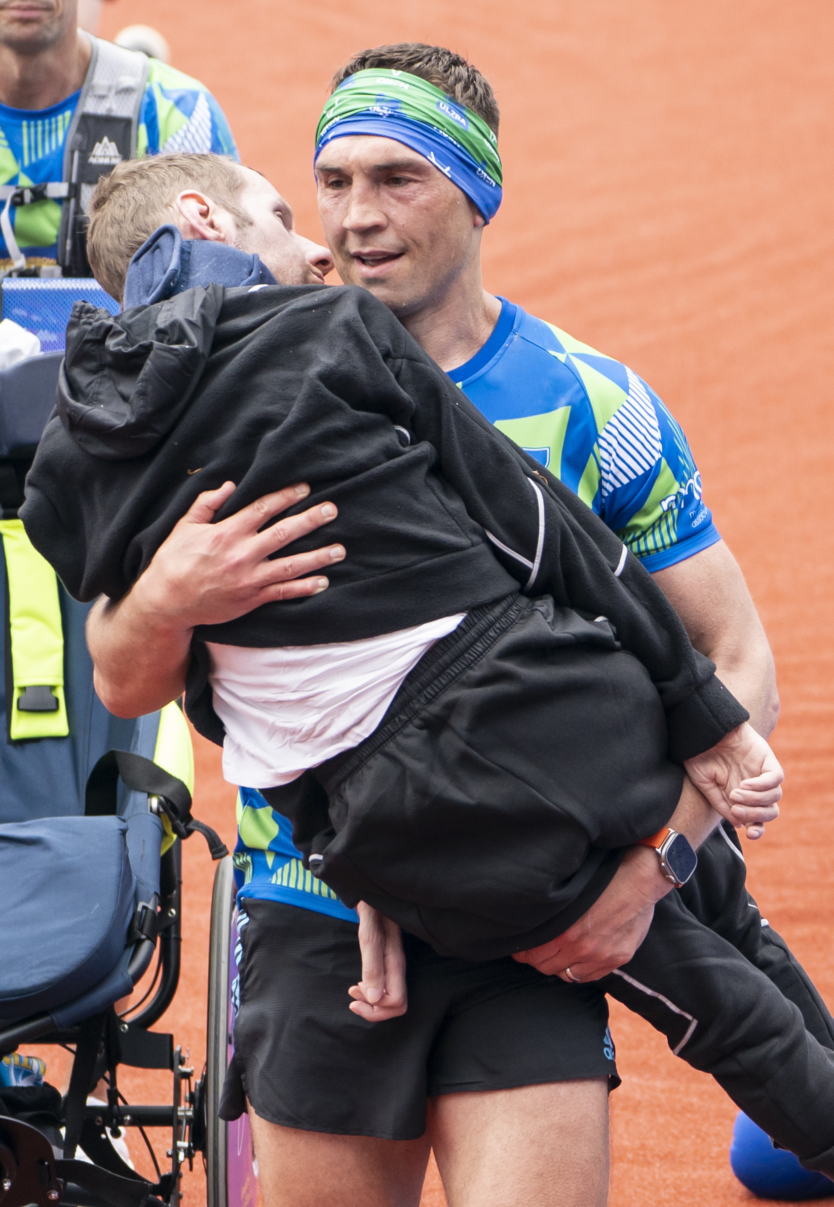 Emotional Kevin Sinfield carries Rob Burrow over finish line at Leeds Marathon
