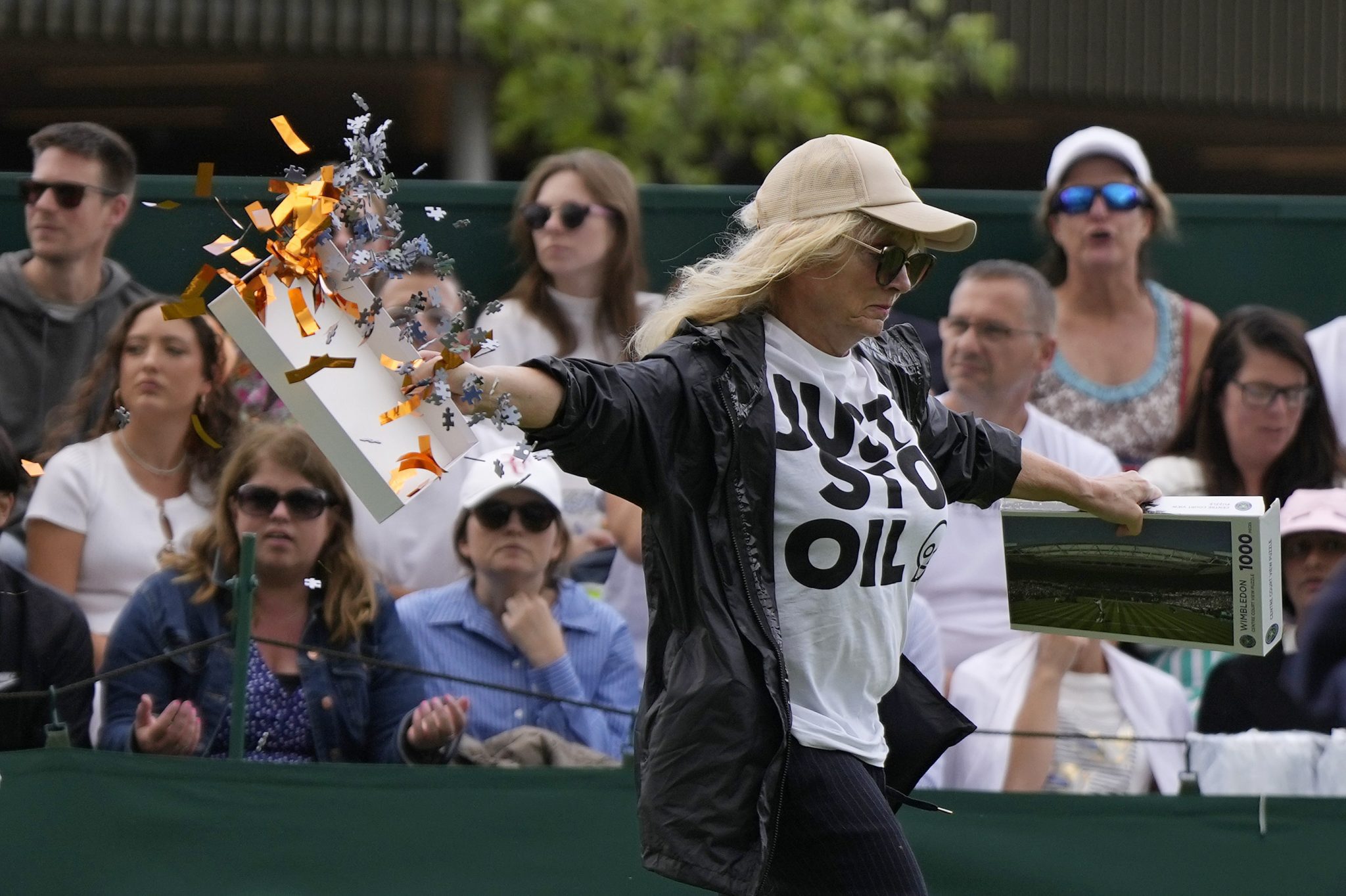 Arrests made after two Just Stop Oil protesters disrupt play at Wimbledon