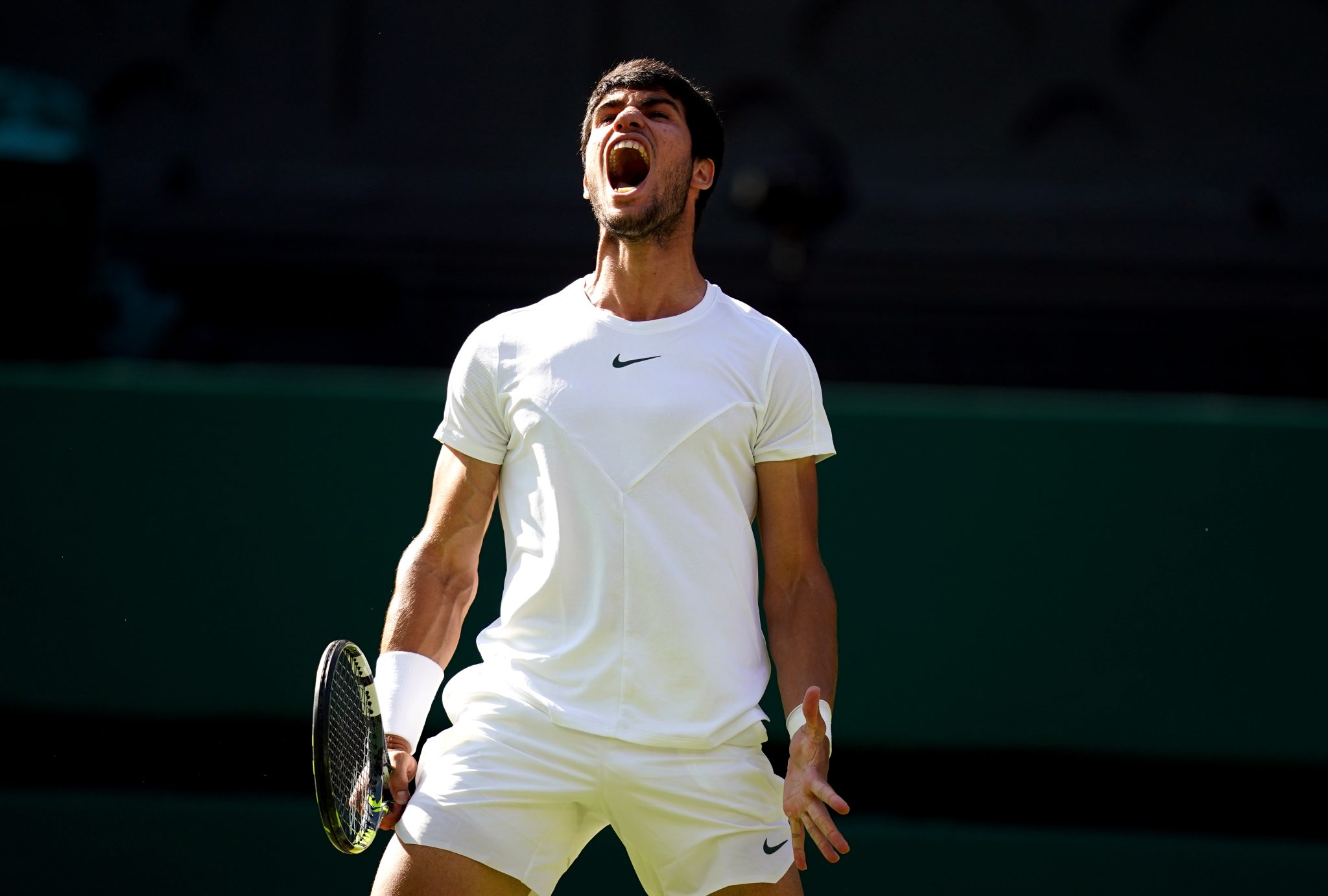 Carlos Alcaraz wins battle of the young guns to reach first Wimbledon semi-final