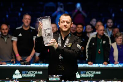 Mark Allen fought off a late scare from China’s Zhou Yuelong to win the English Open in a dramatic climax late on Sunday.