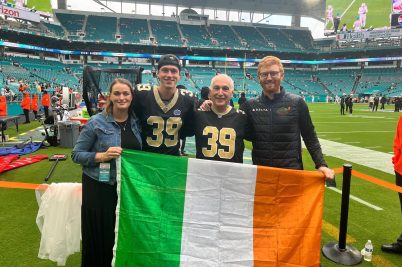 Charlie Smyth, New Orlean Saints poses with his parents after his full NFL debut.